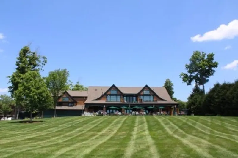 Manicured lawns leading to the clubhouse